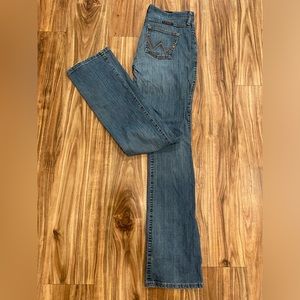 Used and worn Wrangler “Q Baby” jeans